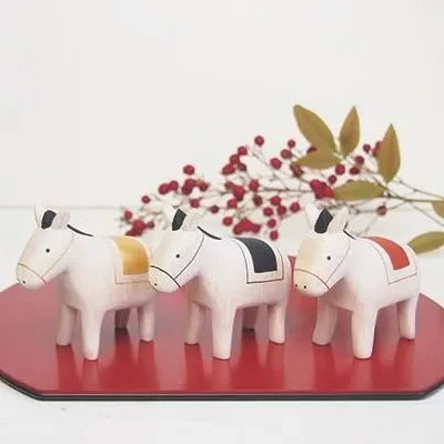 Figurine en bois – UMA rouge – Collection Polepole Animal