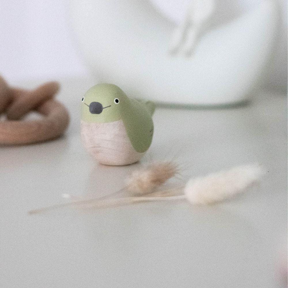 Figurine Oiseau aux yeux blancs en Bois