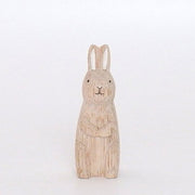 White rabbit standing in wood | Zodiac sign