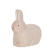 Conejo blanco sentado en madera | Signo del zodiaco