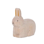 Kaninchen sitzt golden im Holz | Sternzeichen